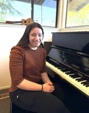 tracina bertolami at a piano