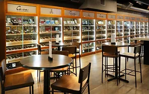 cigar lounge with wall of glass cabinets