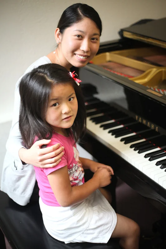 Beginner piano student at Amabile