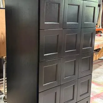 black cigar locker cabinet in workshop